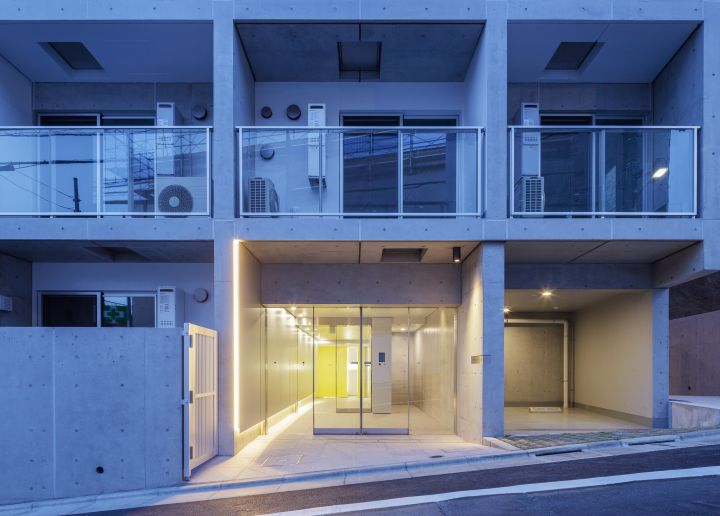 Approach to the building at night